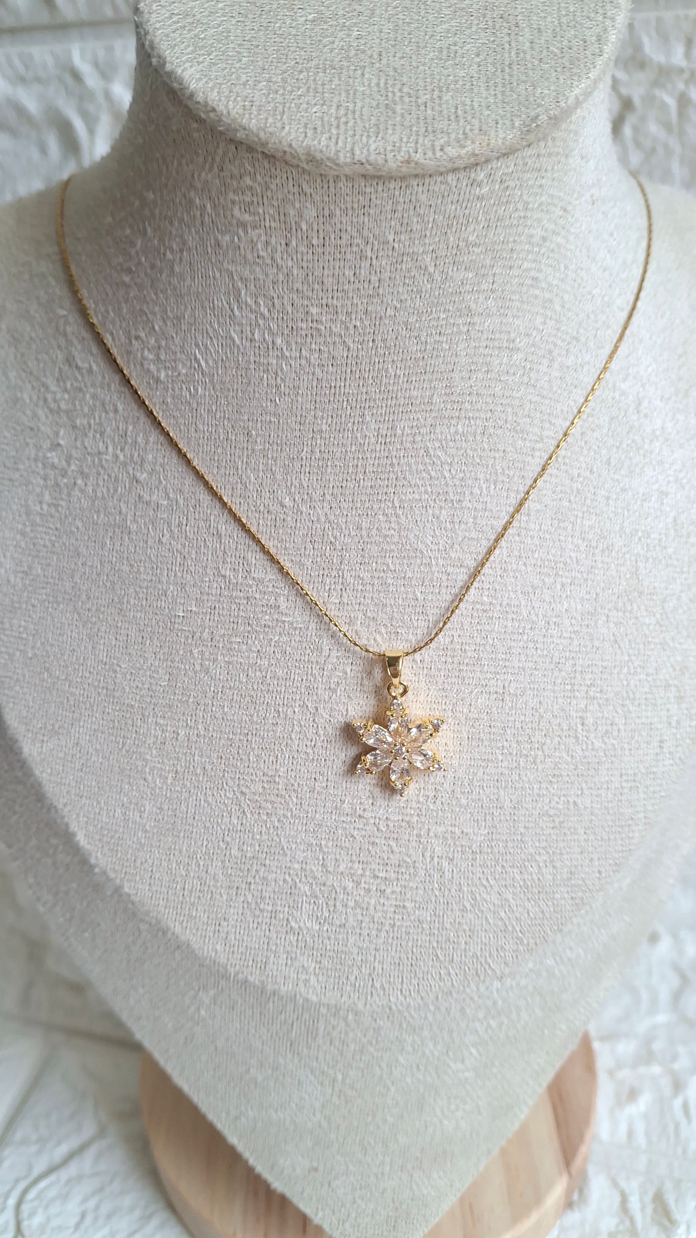 Gold Snowflake Pendant Necklace